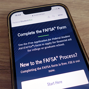 Phone showing FAFSA website